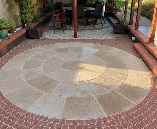 The same circular patio after cleaning and re-jointing